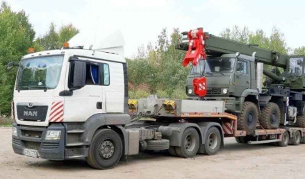 MAN TGS 26.440 и полуприцеп BLSHARTUNG 943100